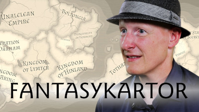 Fantasyforskaren Stefan Ekman framför en fantasykarta.